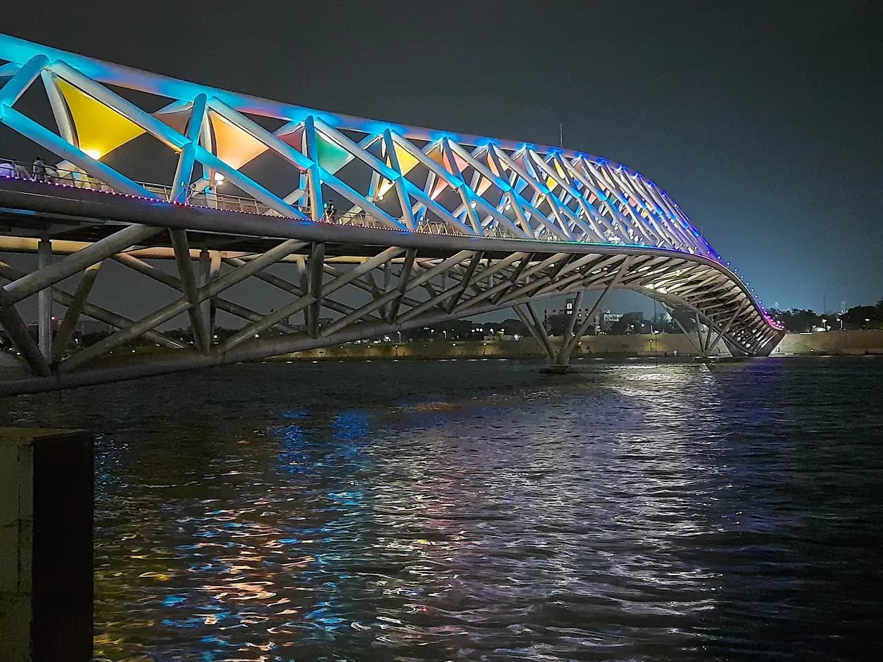 Atal Pedestrian Bridge on the Sabarmati Riverfront, Ahmedabad, Gujarat, lit at night